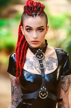 Tattooed Girl In Black Latex Dress